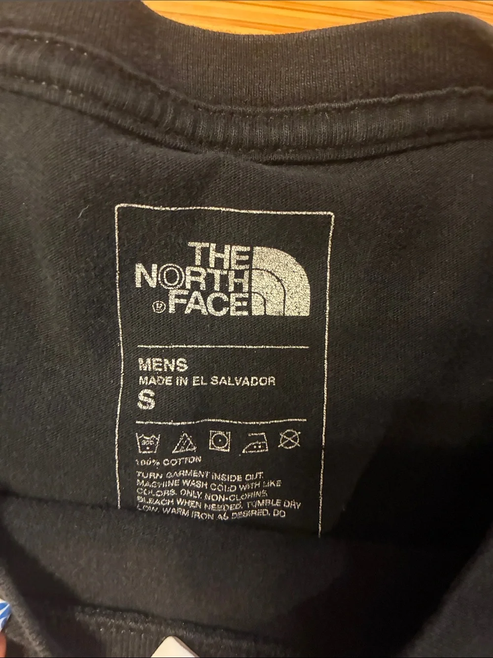 The North Face Black Tee with White Circular Logo